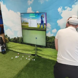 a man playing golf on a tv