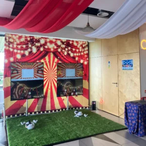 a room with a red curtain and a red and white curtain