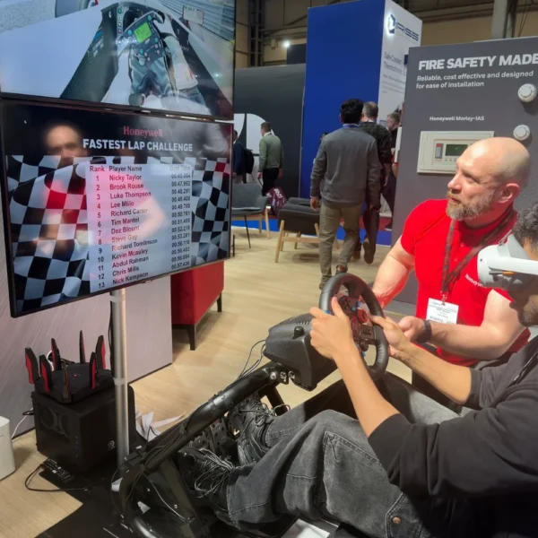 a man in a race car simulator