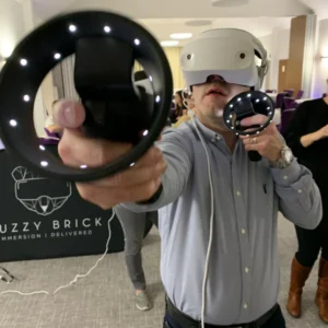 A man playing Sports Day Challenge - Virtual Reality at a company event.