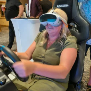 a woman wearing goggles on a gaming chair