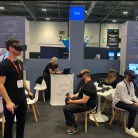 People using a Metaverse brand launch at an exhibition