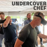 A team playing the Secret agent bootcamp team building as undercover chefs.